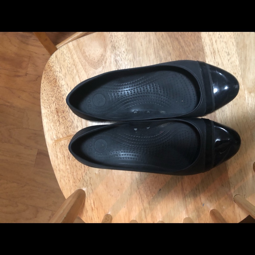 2 pairs of loved crocs! One black, one brown